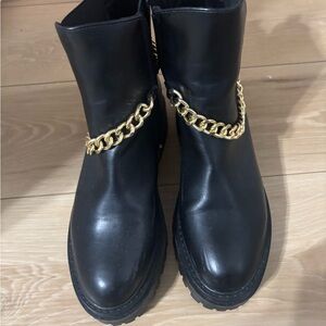 Stylish Black Boots with Gold Detail